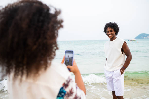 istock Black man is posing for photography at the beach 2177072395