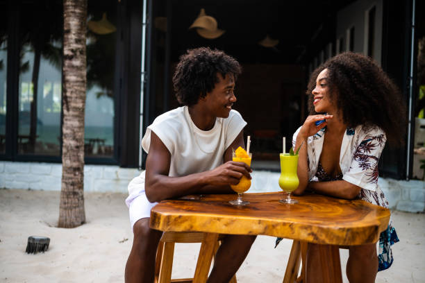 istock Black couple in a beach bar 2177073143