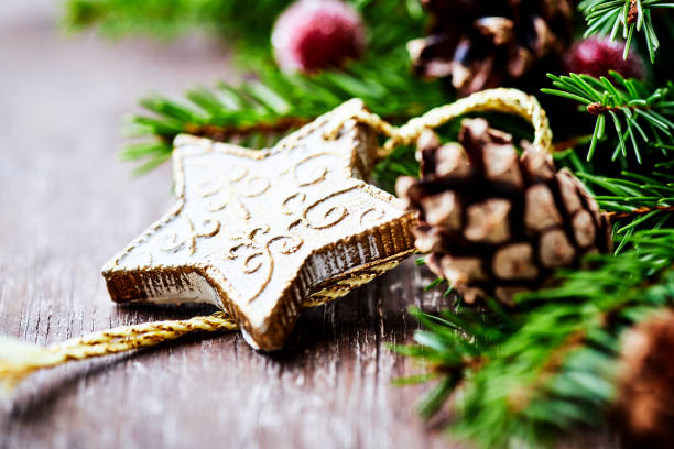 Christmas decoration on rustic wooden background. Close up.