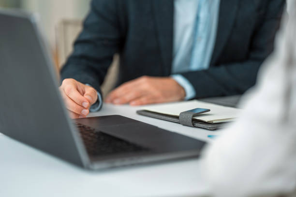 istock Financial Consultation Close Up: Hands at Work 2177078472