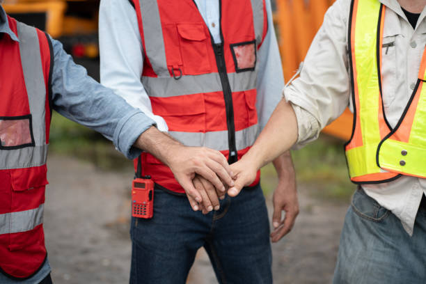istock Hand touching team engineers man worker with spare crane background 2177083564