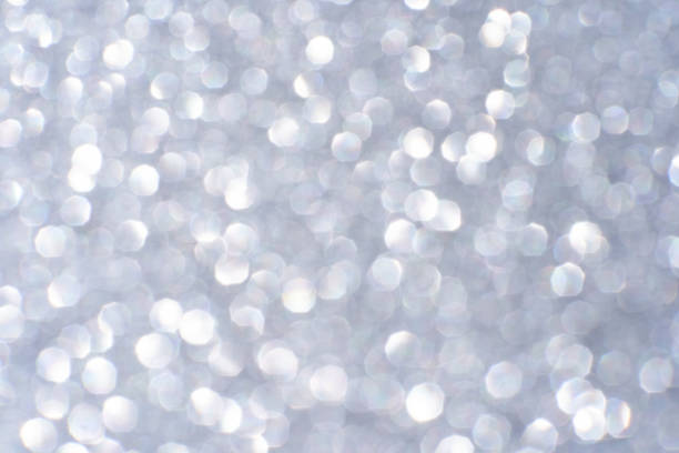 istock Bokeh circle with silver sparkles background. Grey glitter backdrop. Monochrome 2177083619