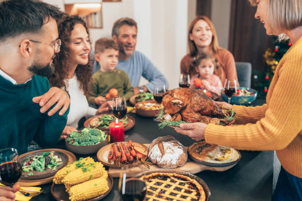 istock Family enjoy Thanksgiving lunch together 2177089548