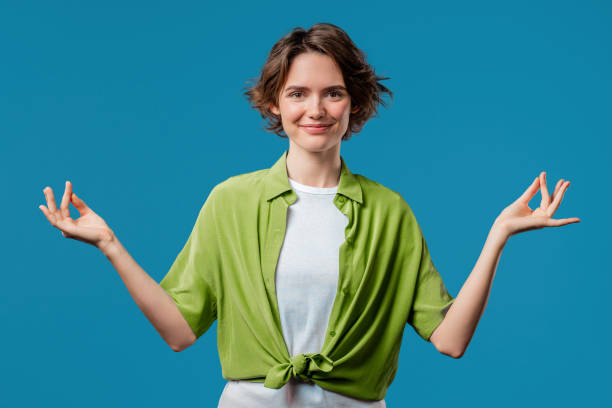 istock Tranquil Woman relaxing, meditating, refuses stress. breathes deeply, calms down 2177089647