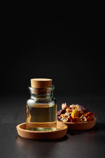 istock Essential oil or herbal tincture in a glass bottle. 2177090291