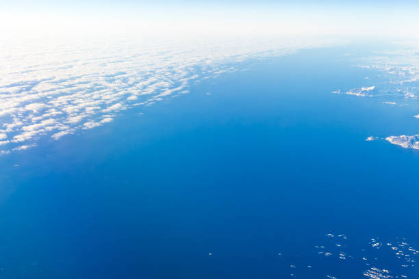 Mountains, Sea, and Clouds Over Greenland
