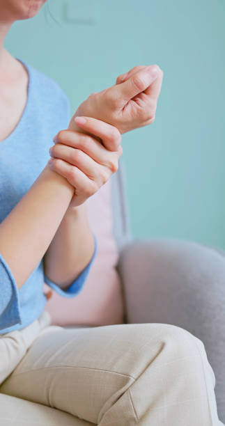 istock asian woman has wrist pain 2177094241
