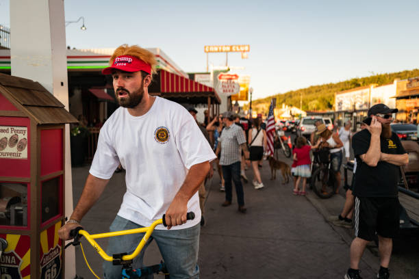 Williams, Coconino County, Arizona, USA,  July 7, 2024: Trump supporter with a wig on the Route 66 on July 7, 2024 in Williams, Arizona, USA.
