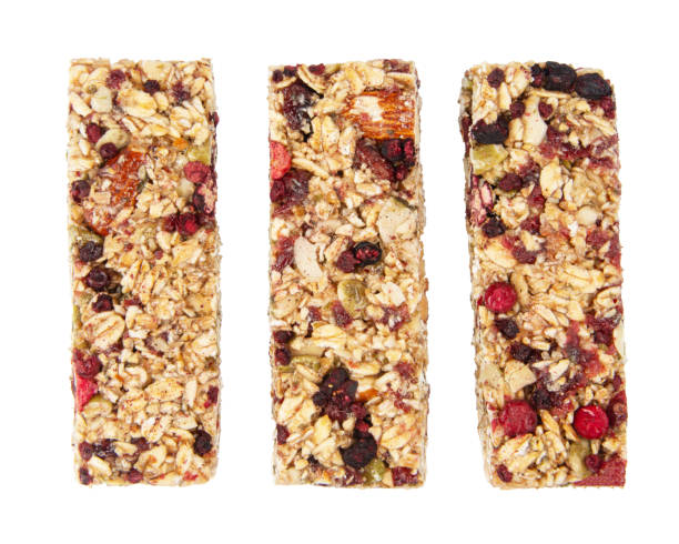istock Granola bar cereal superfood energy nuts with berries isolated on white background 2177101821