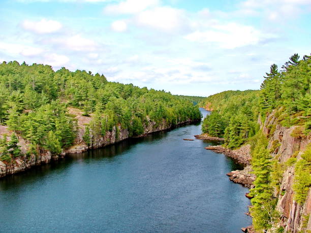 istock French River with clouds in Ontario, Canada. 2177106043