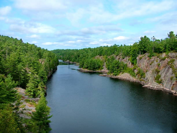 istock French River with clouds in Ontario, Canada. 2177106046