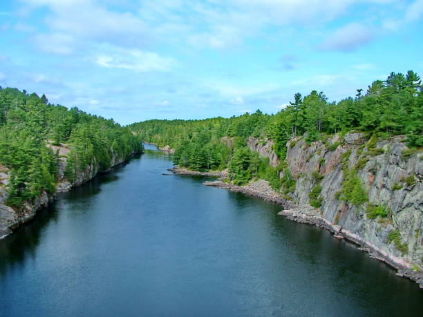istock French River with clouds in Ontario, Canada. 2177106062