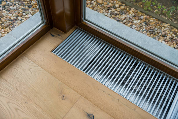 istock Floor heating vent near a large window in a modern home 2177107188