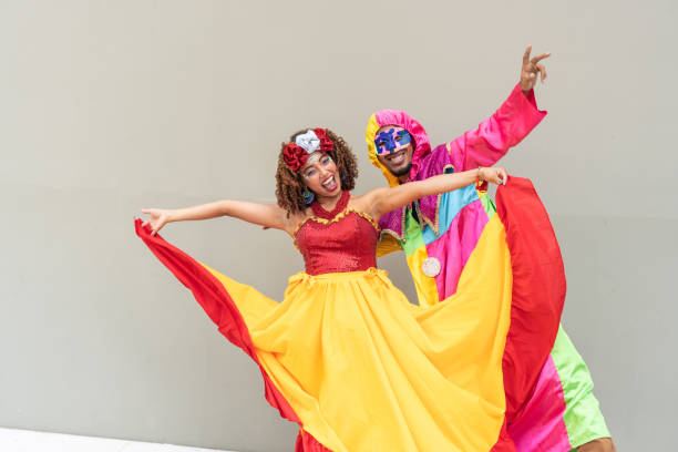 istock Colorful dancers joyfully performing at carnival in traditional attire 2177107315