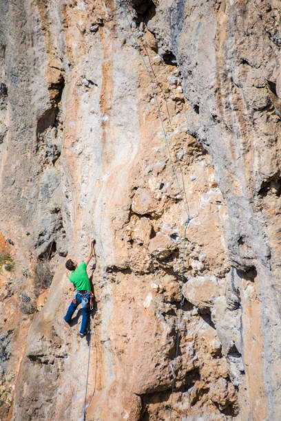 istock A rock climber ascends to the summit via a difficult route. 2177108134