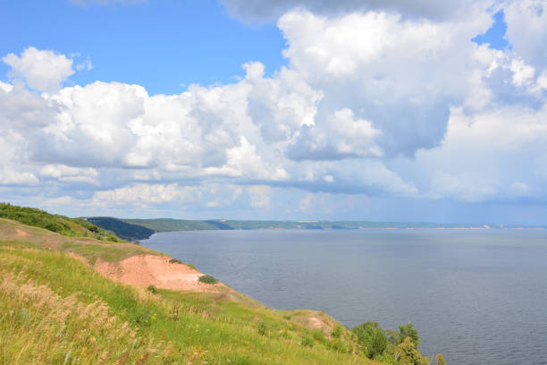 istock a large body of water and a cloudy sky above it 2177114357