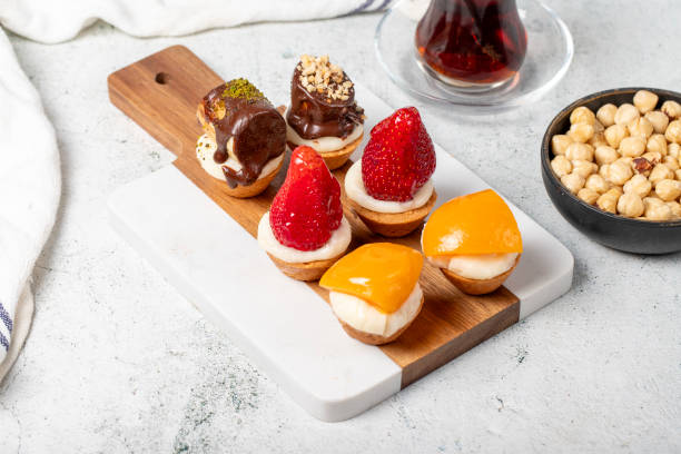 istock Fruit tartlet dessert on gray background 2177127591
