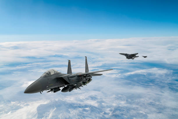 istock F-15 Jet Fighters flying over snowcapped mountains. 2177133449