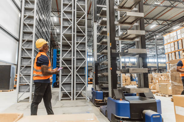 istock Two middle aged multi ethnic male warehouse workers during the daily duties on site 2177133996