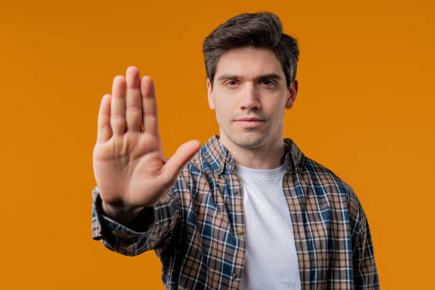 istock Serious Man Showing Rejecting Gesture By Stop Palm Sign. Not Allow, Prohibition 2177138203