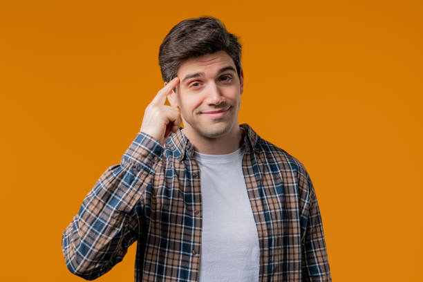 istock Stylish smart man with gesture - you, think about it. Looking camera on yellow 2177138210