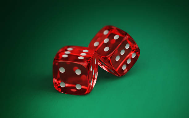 Red Transparent White Dotted Dice on Green Fabric Background