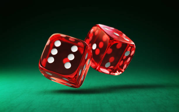3d Render Red Transparent White Dotted Dice on Green Fabric Background, Games of Chance Casino Concept (Close-up)