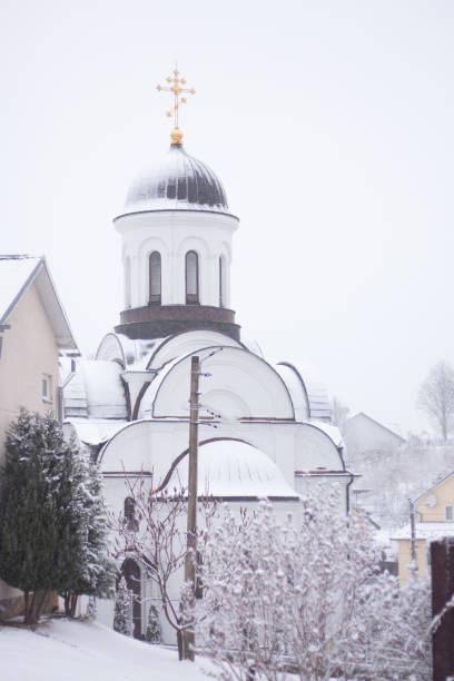 white church in a small town in winter