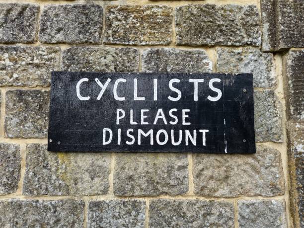 istock Cyclists please dismount information sign, Glasgow Scotland UK 2177143980