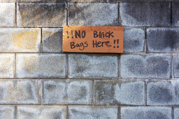 istock Handwritten Sign on Concrete Wall: No Black Bags 2177146390