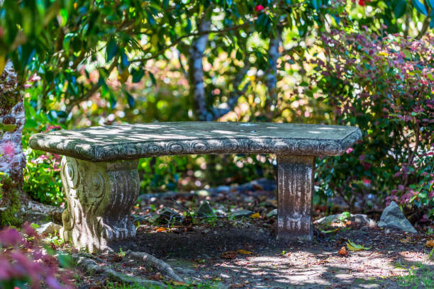 istock Ornate Stone Bench in Shaded Garden Corner 2177146892