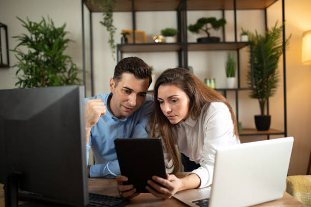istock Two young colleagues working together at modern office stock photoOffice, Technology, Computer, Trainee, Working 2177152414