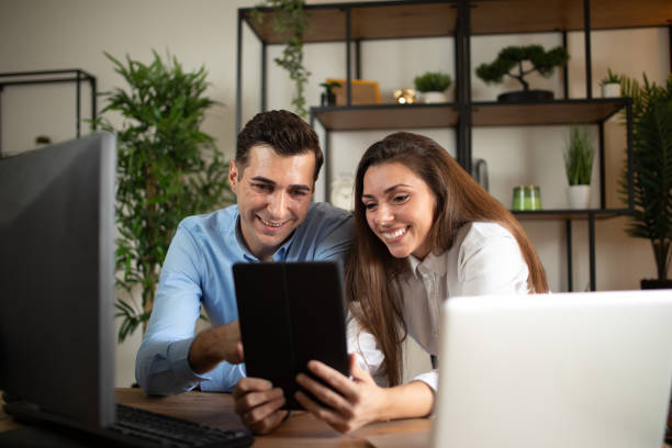 istock Two young colleagues working together at modern office stock photoOffice, Technology, Computer, Trainee, Working 2177152426