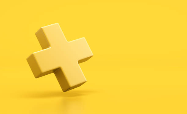 istock Yellow plus sign on yellow background 2177153069