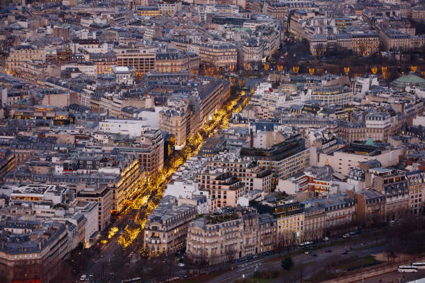 istock Paris with festive lights illuminating the streets in winter 2177155696