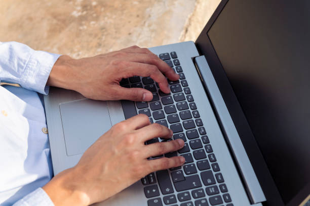 istock unrecognizable entrepreneur hands typing on laptop 2177155877
