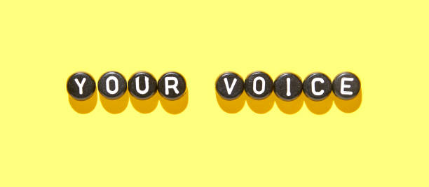 istock Your voice concept with letter beads on bright yellow background 2177156254