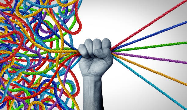 Organizing Solutions Organizing Solutions and organizer concept as a Management leadership taking charge as a leader sorting out diverse ropes into an organized patterns as a business concept for strategy and control. chaos stock pictures, royalty-free photos & images