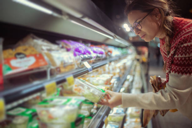 istock Woman is shopping for a healthy snack 2177162976
