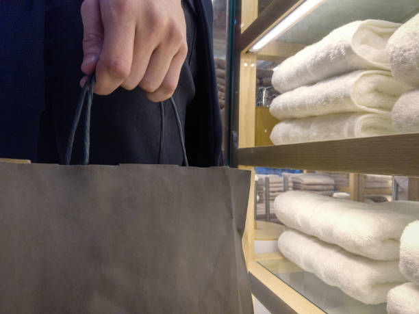 istock A hand holding a shopping bag in Black Friday. 2177167305