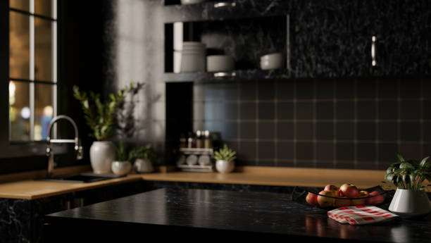istock A modern black marble kitchen island designed for displaying products in a sleek black kitchen. 2177170858