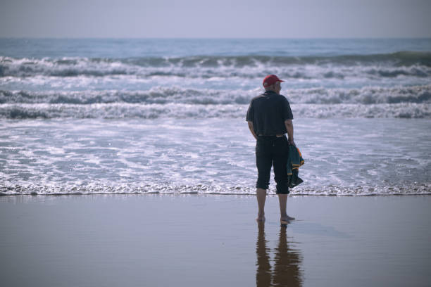 Senior man seen at the beach