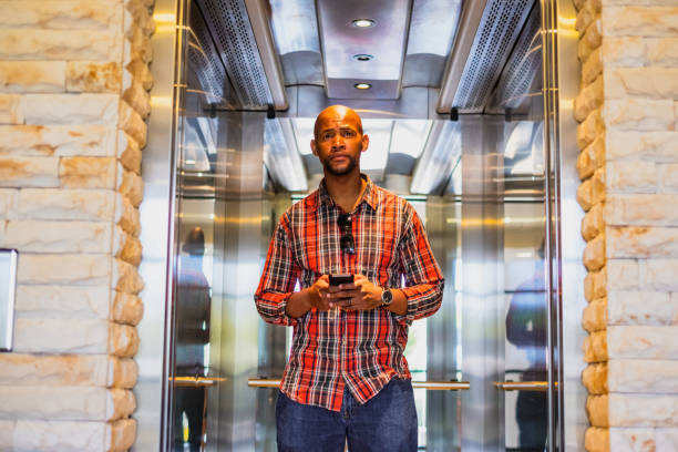 istock Businessman on the move using his mobile phone 2177178443
