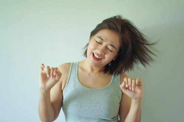 istock Woman standing and posing happily 2177179646