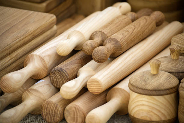 istock Wooden rolling pins arranged in a row on a rustic wooden table under natural light 2177182592
