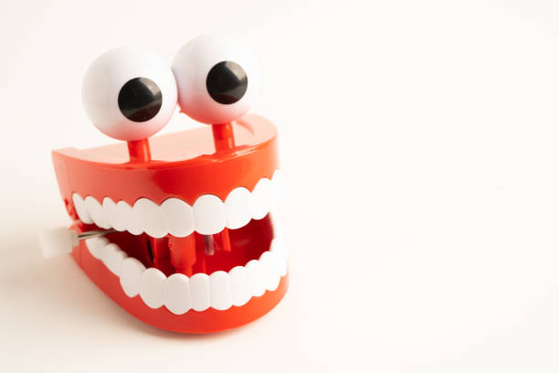istock Tooth funny toy denture red color jaw and eye. 2177182900