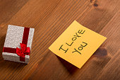 romantic-gift-with-i-love-you-note-on-wooden-table-perfect-for-valentines-day-anniversaries.jpg?b=1&s=170x170&k=20&c=k3DKBZjFTG4t11NLqVxv83c3nnRdyFWhYxfl3AJNp_g=