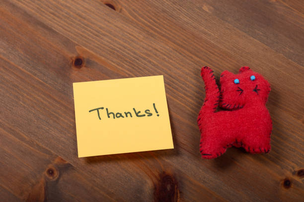 Thank you written under torn paper.