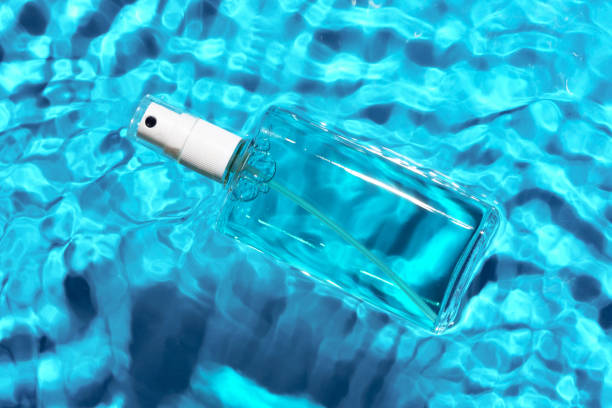 istock Sunscreen bottle floating in a clear blue swimming pool on a sunny day 2177187571