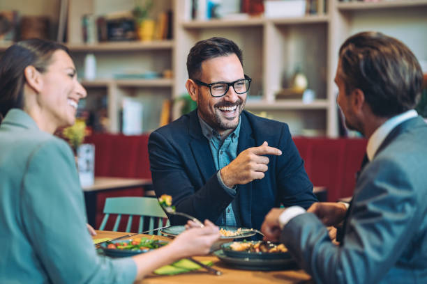istock Business people enjoying lunch together 2177187716